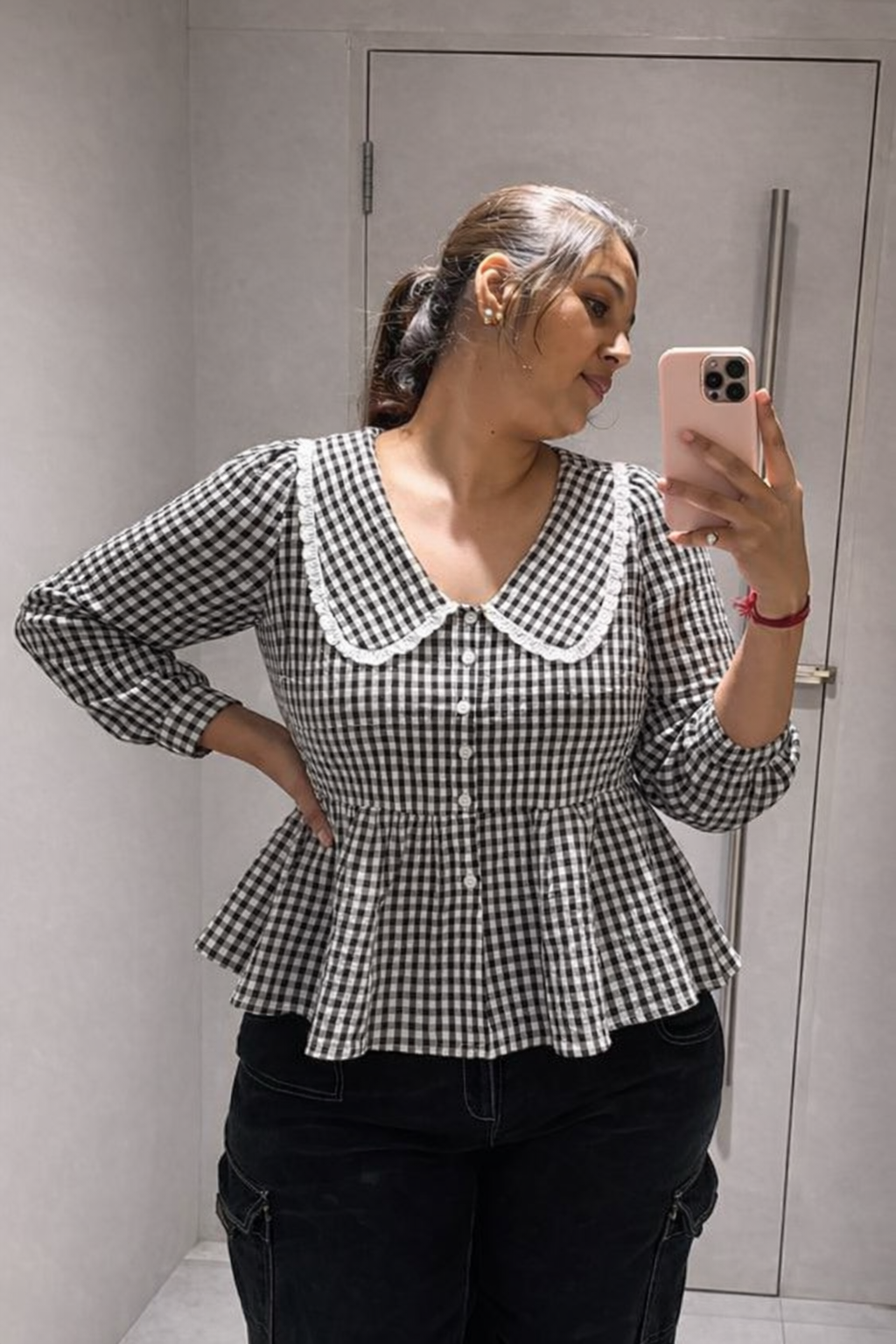 The Checkmate Peplum Top